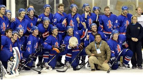 Defeat ends GB's Winter Olympics ice hockey hopes .